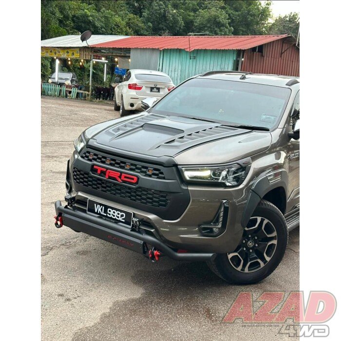 Toyota Hilux Bonnet Scoop Enhance your Toyota Hilux with the Bonnet Scoop, designed to improve both engine performance and aesthetics. This precision-fit scoop optimizes airflow to your engine, boosting efficiency whether you’re off-roading or driving in the city. Key Features Optimized Airflow – Enhances engine cooling for improved performance. Durable Construction – Made from high-quality materials to withstand tough conditions. Aggressive, Sporty Design – Elevates the rugged look of your Hilux. Perfect Fit – Seamlessly integrates with your vehicle’s bonnet. Why Choose the Toyota Hilux Bonnet Scoop? Performance Boost – Helps maintain engine efficiency and cooling. Off-Road & Urban Ready – Functional and stylish for any driving condition. Built to Last – Designed for durability and long-term reliability. Upgrade your Toyota Hilux with the Bonnet Scoop for the perfect mix of style, durability, and enhanced performance. Order now!